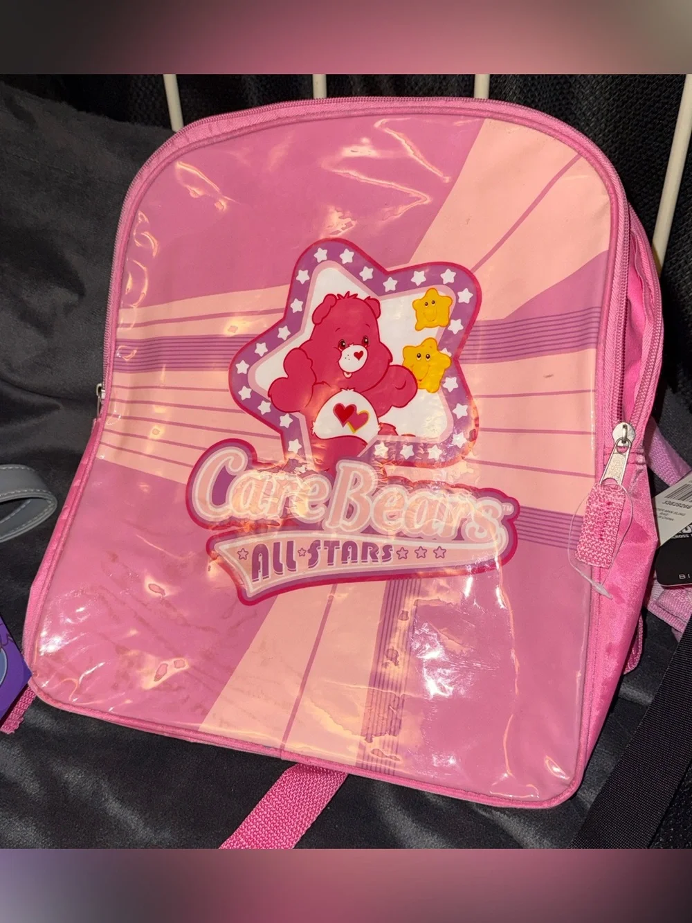 Care Bears pink backpack flaws